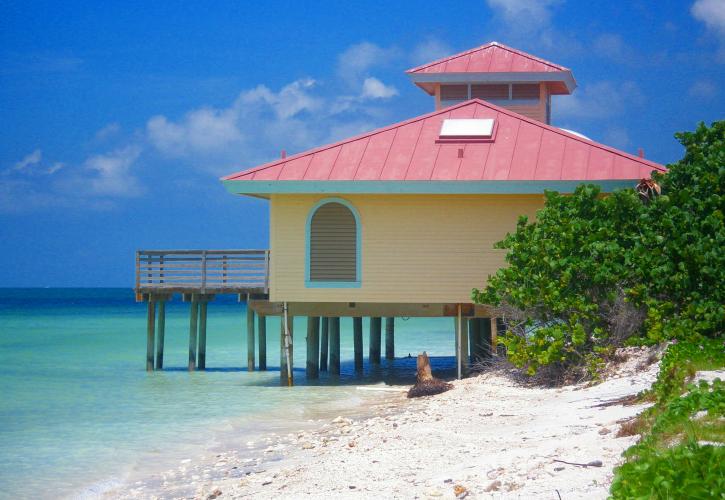 A view of the beach house along the shore.